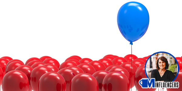 image of a blue balloon rising above red balloons, Thea Dudley